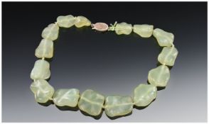 Oriental Style Free Form Hardstone Necklace With Bronze Coloured Clasp.