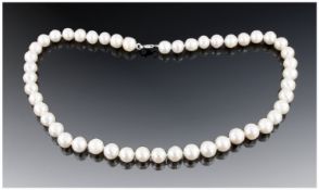 Princess Length String of White Cultured Freshwater Pearls, approximately 8mm near round, high