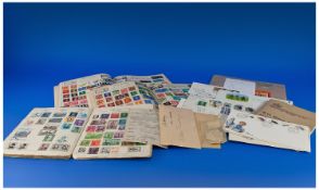 A Quantity of Stamp Albums and Loose Stamps.