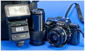 Minolta 7000 Camera and Case, together with minolta flash and accessories.