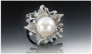 18ct White Gold Pearl and Diamond Cluster Ring, stamped 750, diamond weight 70 points, VS clarity, H