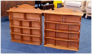 Pair of Similar Mahogany Wall Hanging Display Shelves, each with a shaped pediment and moulded