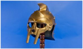 Maximus Style Helmet Gladiator, Raised On A Wooden Stand.