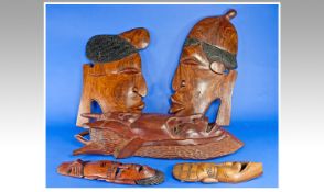 African Carved Wooden Wall Mask, Height 25 Inches. Together With Two Small Face Masks And Two Larger
