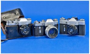 Collection of Various Cameras, comprising a Zenit and a Zenit B camera, each with their original