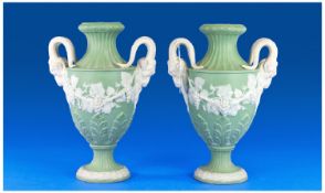 Mettlach Pair Of 19th Century Jasperware Two Handled Mask Vases, green colourway. Each 10.5`` in