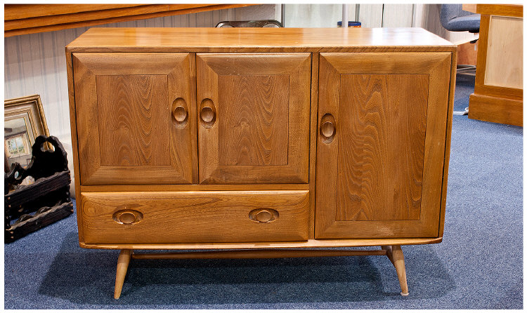 1960`s Ercol Ash Side Cabinet, fitted with two small doors to left opening to reveal single