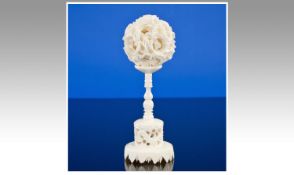 Ivory Puzzle Ball With Stand. Circa early 20th Century. Stands 4.75`` in height.