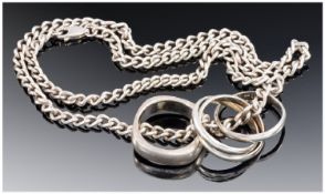 A Silver Chain, plus four silver rings. All fully marked 39.7grams.