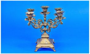 19th Century Ornate Brass Five Branch Candleabra raised on four splayed feet. Stands 9.5 inches in