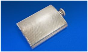 A Silver Plated Whiskey Hip Flask. Bright cut, fully marked to base. 5.25 inches high.