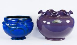 Two Early 20th Century Planters, one in deep purple the other in cobalt blue.
