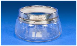 A Silver Banded Cut Glass Powder Bowl, hallmark rubbed. 3.5 inches in diameter and 2.5 inches high.