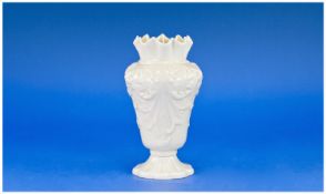 Belleek Rococo Style Vase, the wide shouldered body decorated with raised acanthus leaves below a