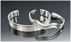 Two Silver Bangles.