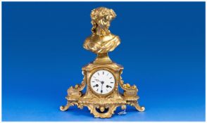 French Figural Clock, Gilt Metal Case, White Enamelled Dial With Roman Numerals, Surmounted By A