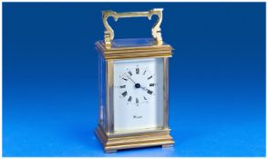 L`Epee 20th Century Good Quality Guilded Brass Carriage Clock with visible escapement and glass