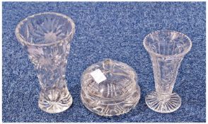 Cut Glass Vase, of waisted form together with a further trumpet shaped vase and a lidded pot.
