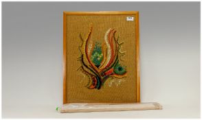 Framed Polychrome Embroidery on a natural hessian ground, 21.25 inches high x 17.25 wide, plus