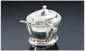 George III Silver Lidded Mustard Pot with reeded borders on plain form with mustard spoon.