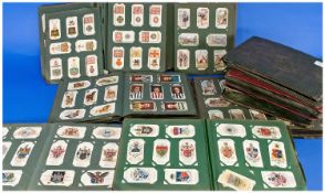 Nine Early 20thC Cigarette Card Albums Containing A Quantity Of Cards Together With A Small