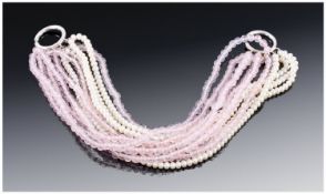 Tiffany & Co. A Designer Silver And Multiple Strand Pink & White Bead Bracelet. The unusual