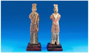 Two Very Early Chinese Figures.11 inches in height with stick and base stands, great deal of wear