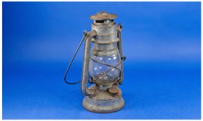 Slovakian Metal Framed Paraffin Lamp, with swing handle, approximately 10 inches high.