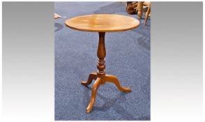 Small 19th Century Mahogany Tripod Table, with oval tilting top, raised on baluster, ring and