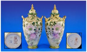 Royal Bonn Pair Of Ornate Porcelain Lidded Vases. Circa 1900. With raised floral decoration. Marks