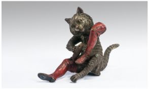 Vienna Style Bronze Cat depicting Puss in Boots, has markings underneath, ``B`` inside an urn.