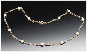 Ladies 9ct Gold Necklace Interspaced with Pearls. Links marked 9.375, 6.2 grams, 16.5 inches long.