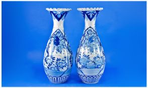 Japanese 19th Century Pair Of Blue & White Baluster Tall Vases, with flared rim over narrow neck and