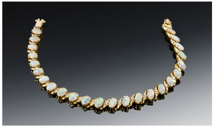 18ct Gold Opal And Diamond Bracelet, Comprising 24 Oval Cabochon White Opals Of Good Colour (