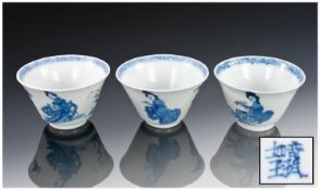 Three Chinese Conical Shaped Blue and White Cups, of Fine quality, decorated with a small boy