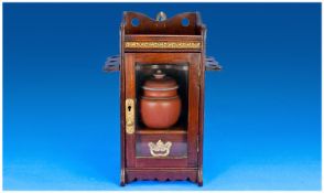 Edwardian Oak Smokers Cabinet with pipe racks and tobacco jar, with interior drawer. Height 13