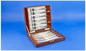 Boxed Set of Six Silver Plated Cake Knives and Forks, mid 20th century.
