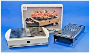 Two Hot Plates (multi purpose table top warmers). Both boxed.