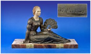 French Cold Painted Spelter Figure Signed H. Molins. Circa 1920`s, `Lady with Fan Reclining on a