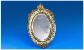 19th/20thC Brass Framed Oval Strut Mirror With Cloisonne Border, Surmounted By A Garland Of Ribbons,