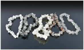 Five White Hardstone Elasticated Bracelets including fluorite rutile quartz etc.