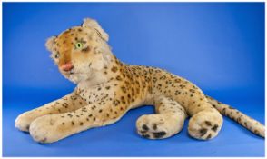 Steiff Vintage Large Straw Filled Stuffed Reclining Leopard Cub, circa 1950`s, 32 inches paw to paw,