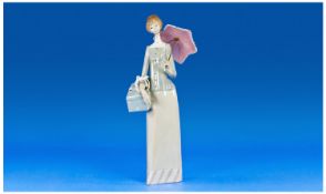 Lladro Figure `Dressmaker`, model no 4700. Issued 1970 - 93. Height 14.25 inches.