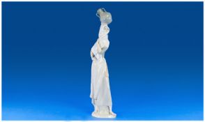 Lladro Style Vintage Figures `Water Carrier` not marked. Stands 16.5`` in height.