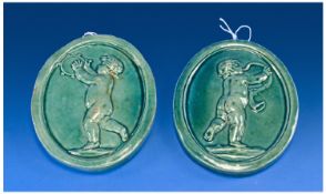 Dunmore Pottery Blue Cherub Oval Plaque, Circa 1880. 5`` in height.