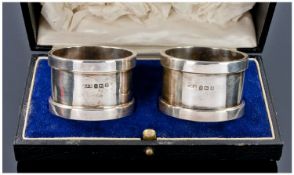 A Boxed Good Quality Pair Of Silver Napkin Holders, Hallmark Birmingham 1926. Makers Mark D&B.