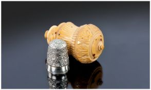 A Carved Vegetable Ivory Thimble Holder which unscrews into two halves and contains a