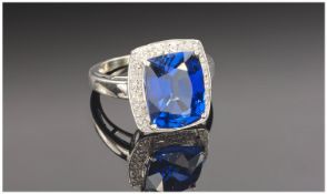 Ladies Fine 18ct White Gold Tanzanite and Diamond Cluster Ring, comprising Centre rectangular