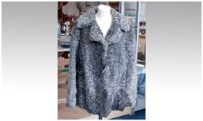 Grey Marl Swedish Curled Lamb Jacket, self lined collar with wide revers, princess seams to back,