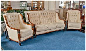 Classic Leather Three Piece Suite, upholstered in cream, comprising three seater settee and two